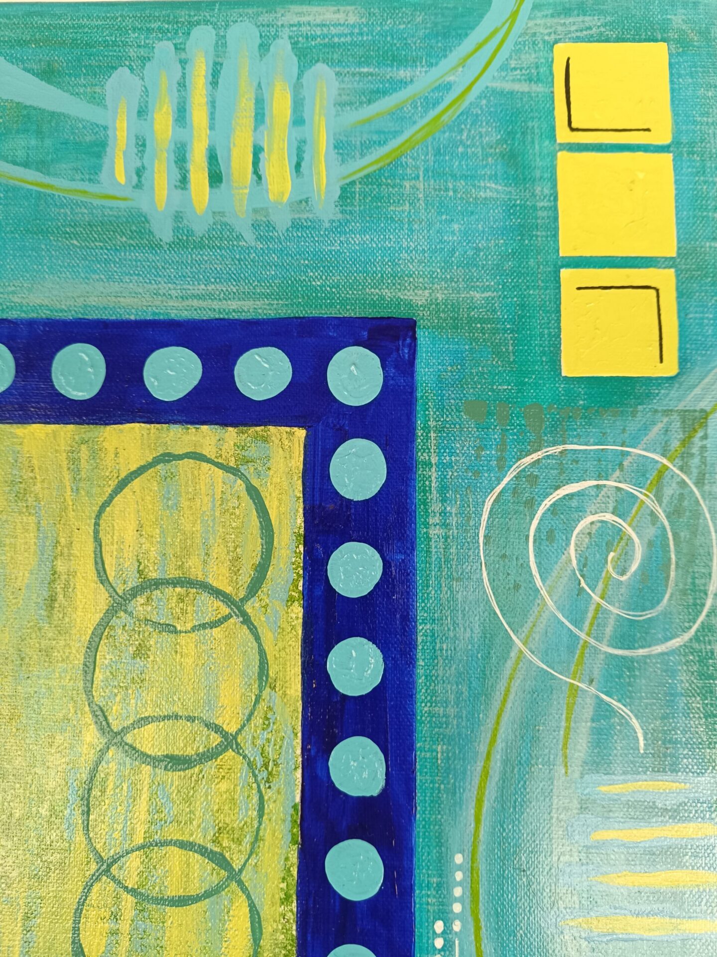 Détail des textures et des superpositions de couleurs bleu roi et vert anis sur la toile.